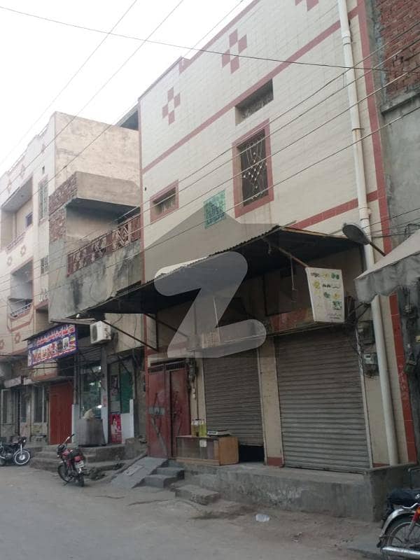 Double Storey House With Shops in Singhpura For Sale
