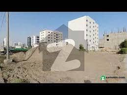 100 yards commercial plot right time to invest your money in dha all around contraction starts bright future
