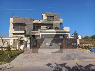 one kanal heighted and on main road good location house is available for sale at block H ECHS D-18