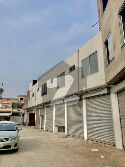 5.5 Marla Ideal Location Commercial Building With 6 Ground Floor Shops Available For Sale.