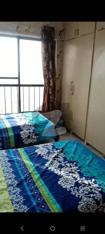 only FEMALE working furnished sharing room attached washroom common kitchen CLIFTON BLOCK2