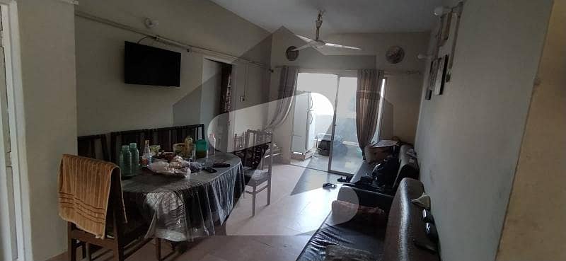 In North Karachi11-l Good Location Main Road 1st Floor, Flat 3 Bed Drawing Dinning Attached Bath Attached Balcony, Store Rooms.