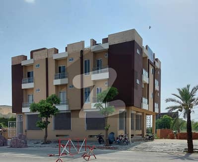 16 Marla Commercial Corner Plaza With Basement And 6 2 bed flats with rental Value is 4lac 50 thousand