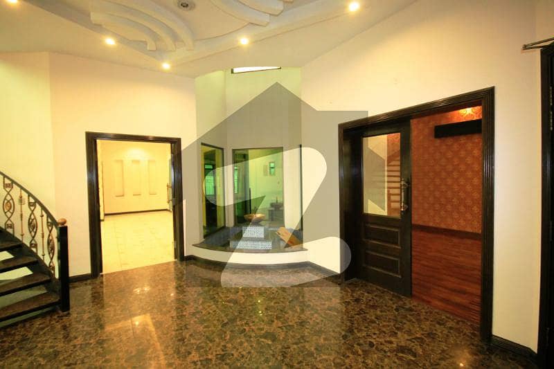 1 Kanal Full Basement Spanish Corner Bungalow With Home Theater For