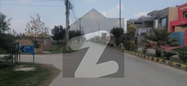 Facing Park Khayaban-e-Manzoor Commercial Plot Sized 2.7 Marla For sale