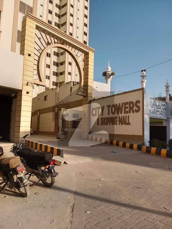 سٹی ٹاور اینڈ شاپنگ مال یونیورسٹی روڈ کراچی میں 2 کمروں کا 5 مرلہ فلیٹ 1 کروڑ میں برائے فروخت۔