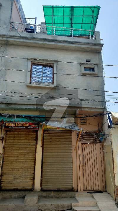 3 Marla House Commercial property with 2 shops Best for rental income