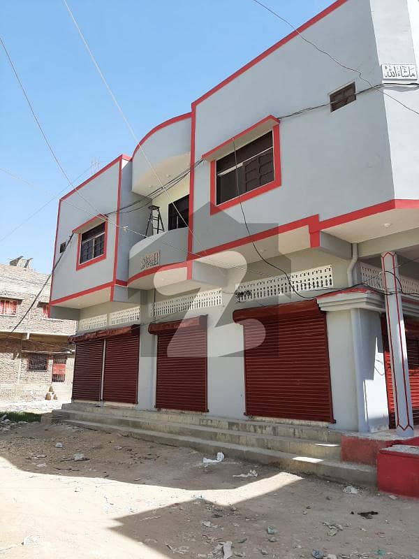 Corner Double Story House with 4 Shops at Pinyari Canal Adjacent Govt. College Univeristy Kali Mori Hyderabad.