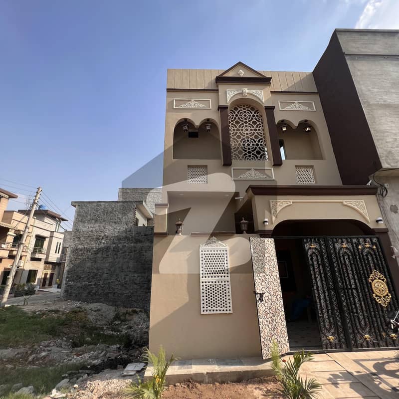 3 Marla Brand New House B Block Al Rehman Garden.