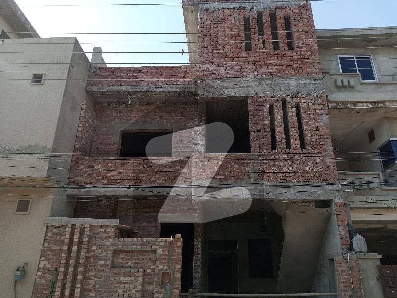double storey grey structure house for sale