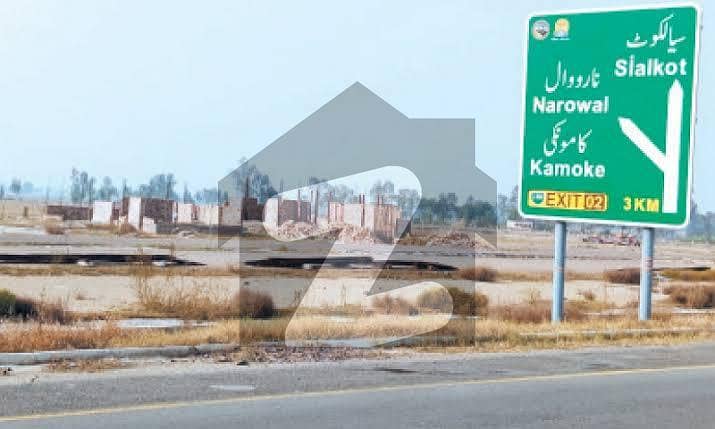 60 marla commercial plot for sale main ring road near lahore sialkot motorway reasonable for sale