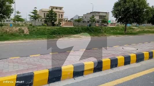 ***CHEAPEST PLOT***SURROUNDED BY BEAUTIFUL HOUSES***DHA LAHORE