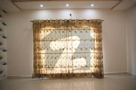 14 Marla Like New House Available for Sale In Bahria Town Lahore.