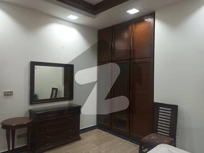 DHA PHASE 5
ONE KANAL FURNISHED HOUSE AVAILABLE FOR RENT 
5 BEDROOM WITH ATTACHED BATHROOM 
2 T V LOUNGES 
DRAWING DINING 
2 KITCHEN 
Excellent FURNITURE 
 7 AIR CONDITIONS
Installed 
All curtains fixed
Rent demand 4 lac