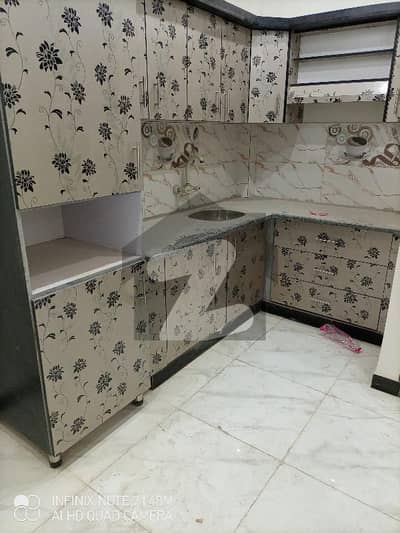 2 bed lounge Brand new 2nd floor
portion available for sale at azizabad
blk 2 near scoller collegiet