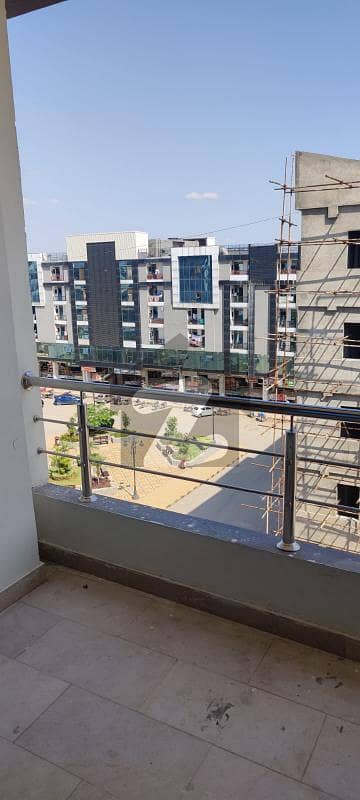 Faisal town A-block mazkaz 925 square feet 2 bedroom flat available for sale