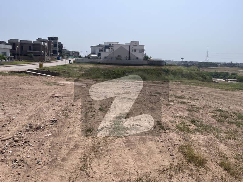 Bahria Phase 8 block A Kanal with 15 Marla Extra land Back , front & side open Hiegh location plot Available