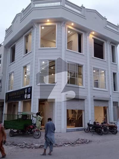 Commercial Triple Storey 
Building Sized 4 Marla Is Available For Sale In Model Town - Block A