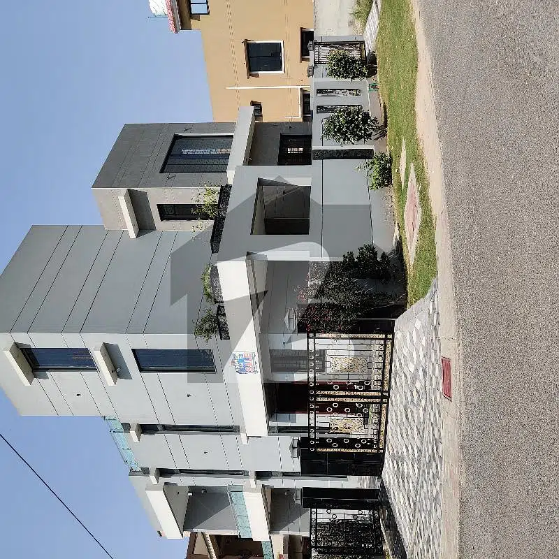 10 Marla Corner With Basement Double Story Brand New House For Sale In Tariq Garden Near Wapda Town Phase 1 Prime Location