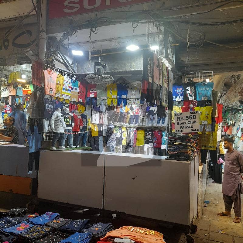 High Value, Two Sided, Road Facing Corner Shop of Ready-made Garments in Famous Jama Cloth Market.