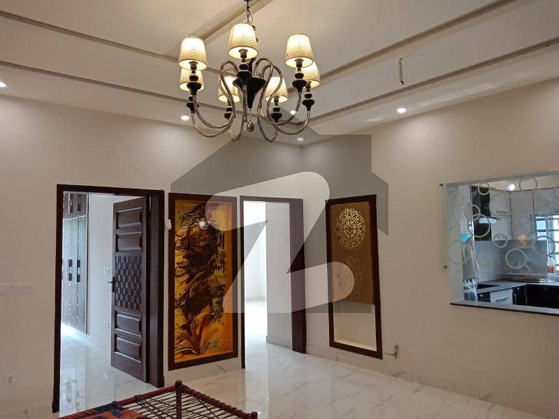 10 Marla Like New Lower Portion Facing Park Available For Rent In Bahria Town Lahore.