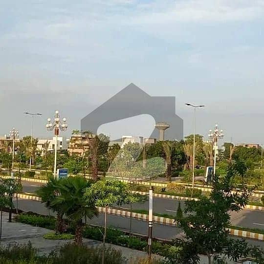 10 Marla Commercial Possession Plot For Sale Adjacent To Main Boulevard,
Dream Gardens Lahore