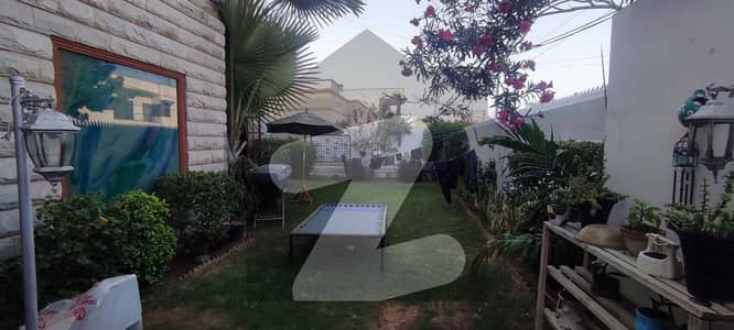 6 Bedroom Oasis in DHA Phase VII Kh-Rizwan Gem with Lush Green Lawn