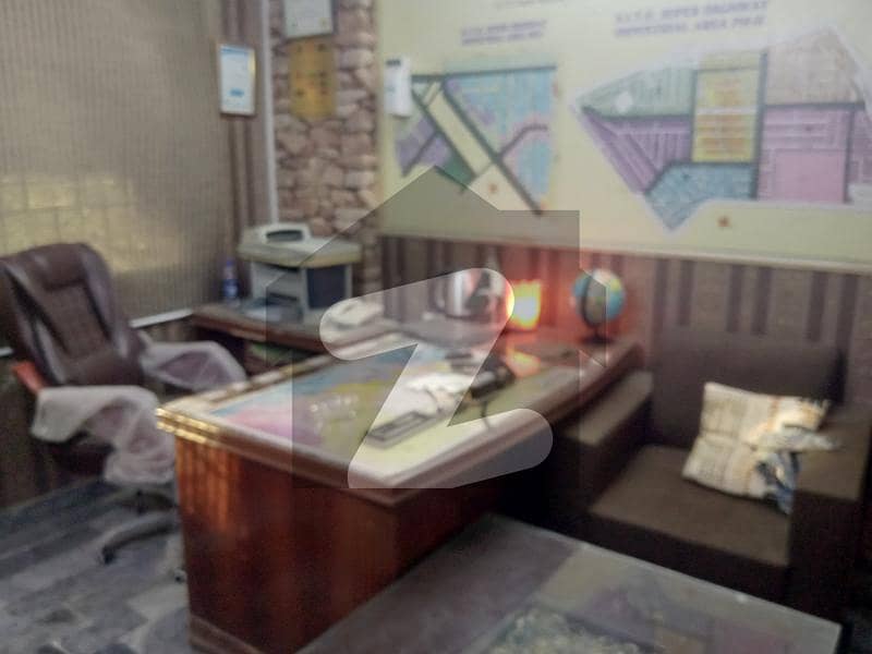 Commercial office with well furneshed at Mezzanine floor in Decent Garden block 7 Gulstan-Johar at main University road available for Ren.