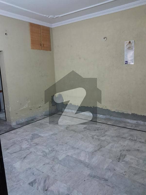 10 Marla Double Storey House For Sale On 25 Feet Street In Aamir Town Near Canal Road