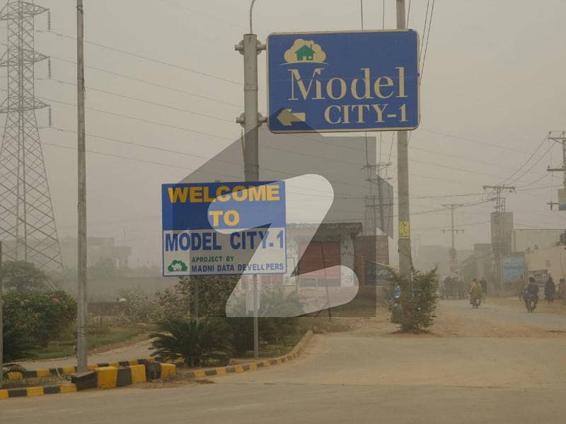 4 Marla Plot Is Available For Sale Model City 1, Canal Road, Faisalabad