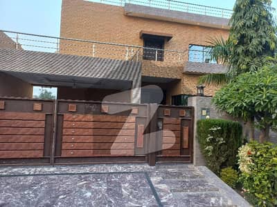 1 kanal single storey house 4 bed with attach bath for sale in tariq gardens society