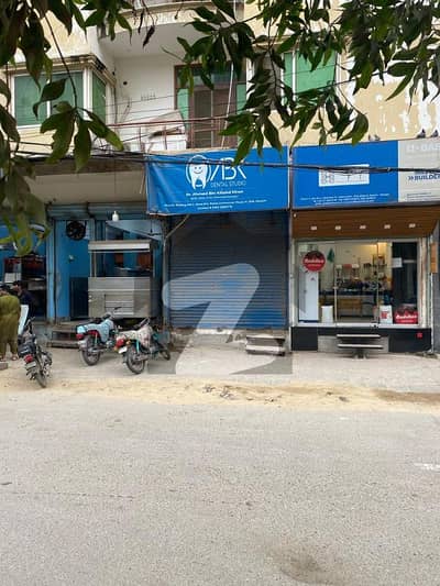 SHOP FOR SALE (RENTED ON 45K ) PRIME ROAD AT MAIN NISHAT COMMERCAIL DHA ...