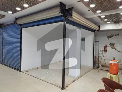 100 sq ft corner shop for sale in shopping center of main Hyderi area