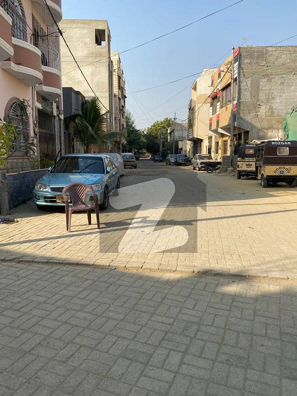 PRIME LOCATION CORNER 120 YARDS PLOT WITH EXTRA LAND BOUNDARY WALL