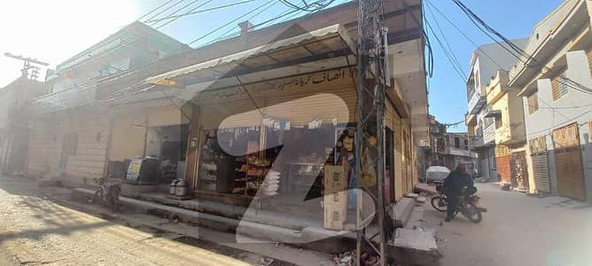 10 Marla Corner House With Attached Commercial Shops Available For Sale