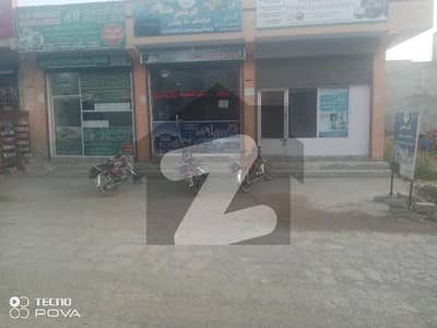 4.5 Marla Building 4 Shops And Attached 2 Room Main Double Road Samarzar Housing Scocity Adyala