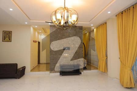 Sector B 1 Kanal Triple Storey House For Sale In Bahria Town Phase 8 With Extra Land For Lawn
