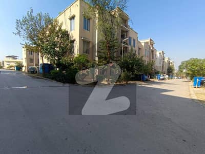 Corner Apartment On Ground Floor With Beautiful Lawn Available For Sale
