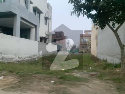 5 MARLA RESIDENTIAL PLOT BLOCK "2F" 3RD PLOT FROM "50" FEET WIDE ROAD IS FOR SALE