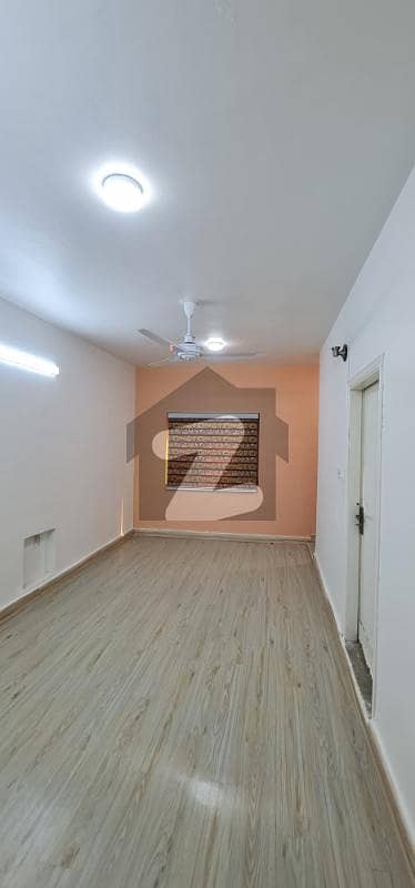 F-11: Furnished Spacious Room with Attached Bath, Balcony, Shared Kitchen, Calm Environment, Rent Rs. 40,000- Only,