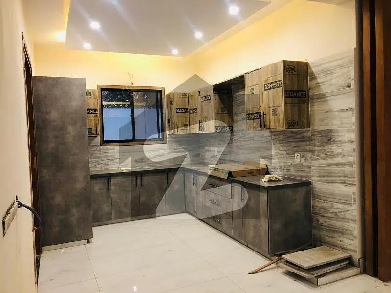 Brand New West open Bungalow 5Bed Drawing Dining With Basement And Servant Quarter Powder Washroom Study Room And Dirty Kitchen With 2 Indoor Car Parking Nearby Shaheed E Millat Ferozabad And Shahra E Faisal