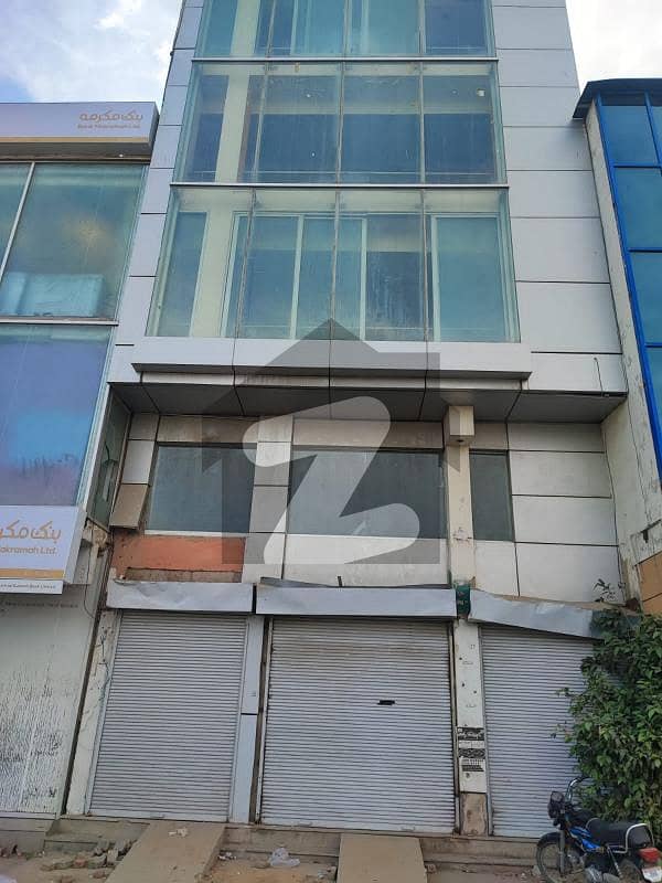 "Prime Commercial Opportunity! 91 SQ Yard Building in DHA Phase 1 for Sale. "