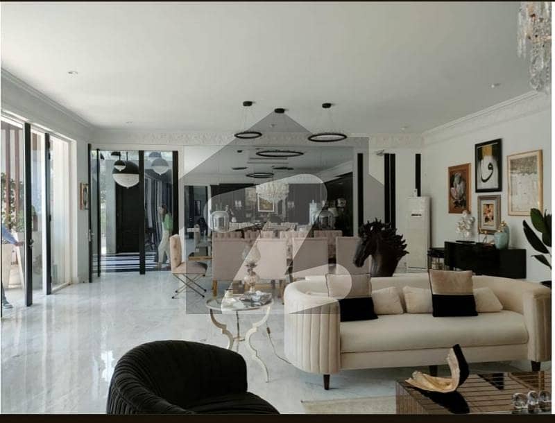 1000 YARDS LUXRIOUS HOUSE IN PHASE V FOR SALE