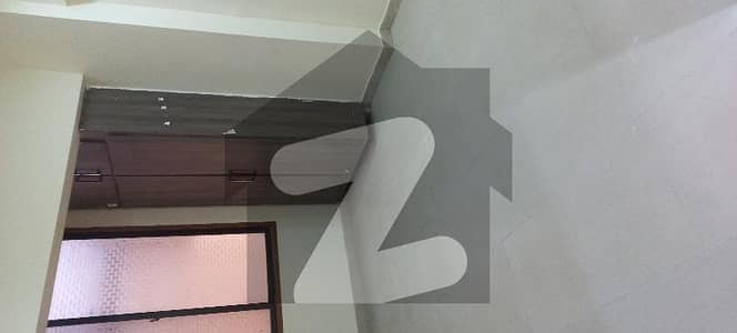 GULISTAN E JOHAR BLOCK 14 GROUND FLOOR FLAT APPROX 700 S FT 2 BED WITH ATTACHED BATHS LOUNGE KITCHEN AVAILABLE FOR SALE