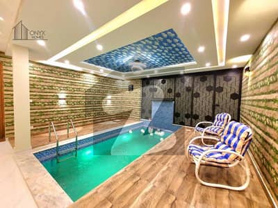 BRAND NEW 24 MARLA 
HOUSE WITH BASEMENT ,SWIMMING POOL,GYM