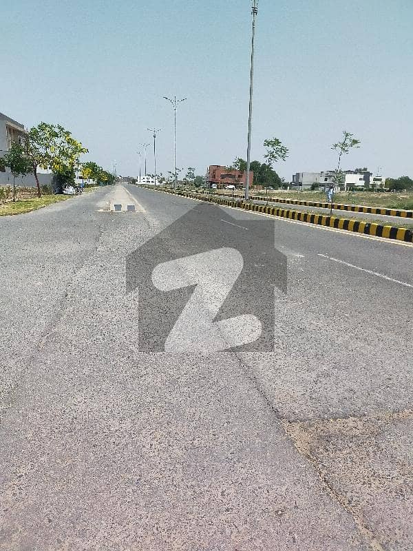 DHA PHASE 7 ONE KANAL PLOT FOR SALE IN HOT LOCATION AND 150 FT NEAR MCDONALD'S