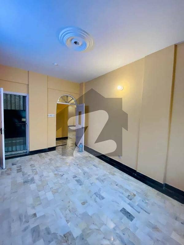 Cozy 2-Bedroom Apartment for Rent in DHA Phase 2 Ext - Family-Friendly Building.