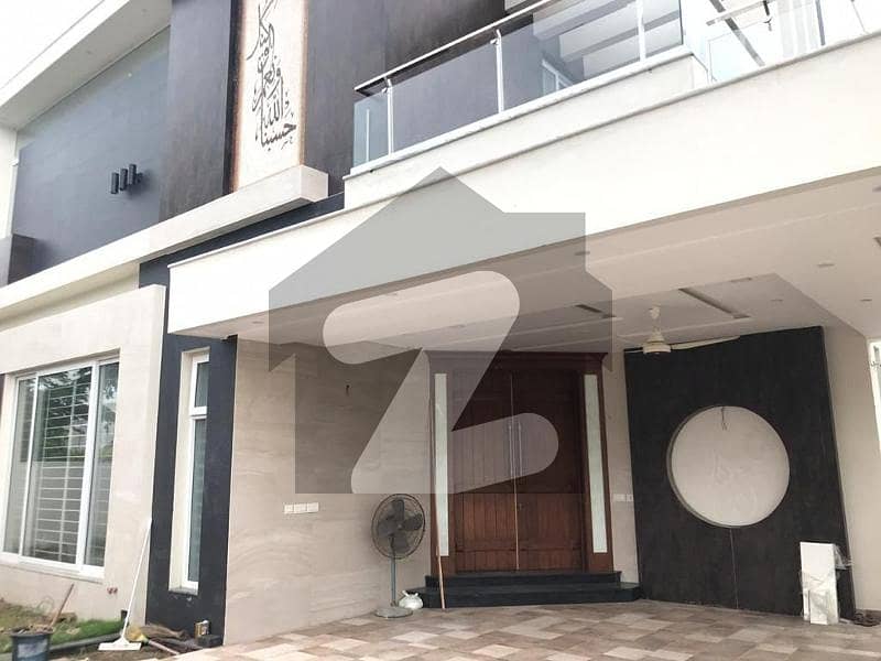 One Kanal 3 Year Old Slightly Used Ultra-Modern Designer Full Basement Bungalow for Sale at prime Location of DHA Lahore