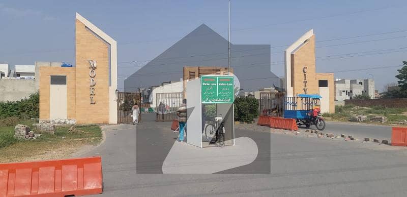 ماڈل سٹی ون کینال روڈ,فیصل آباد میں 5 مرلہ رہائشی پلاٹ 90.0 لاکھ میں برائے فروخت۔