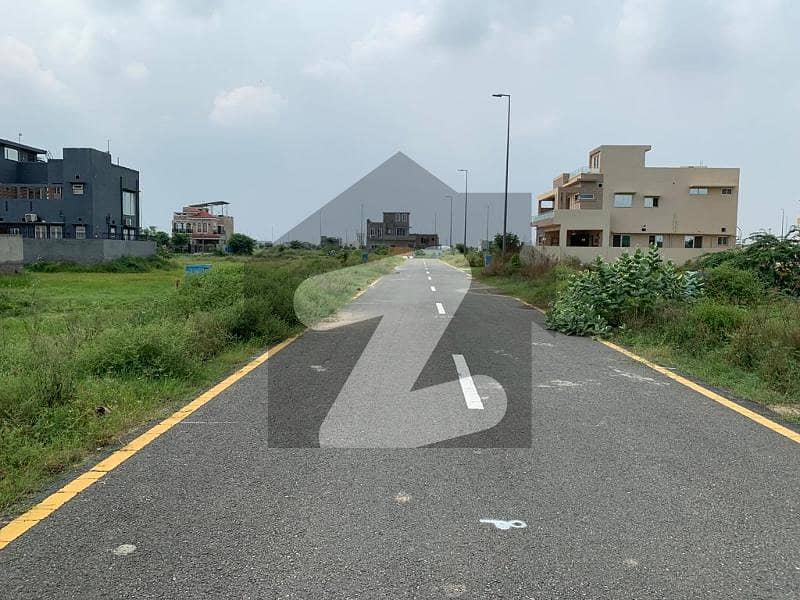 1 Kanal Corner V-607/11 Good Location Back Of Main 70ft Road Near To DHA Golf Raya Clear Plot Is Available For Sale In Phase 7 Dha Lahore